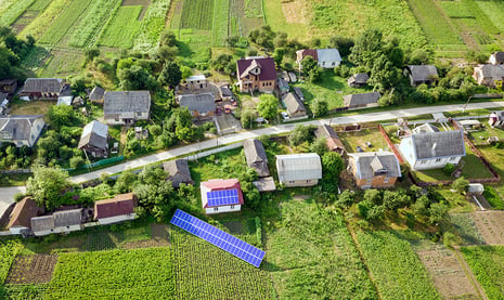 aerial-view-of-a-house-with-blue-solar-panels-for-2022-01-11-03-04-18-utc