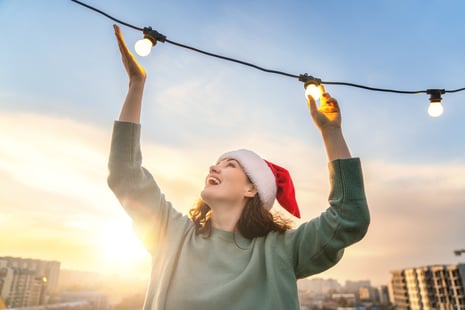 woman-is-decorating-terrace-with-garlands-2024-11-05-08-26-51-utc